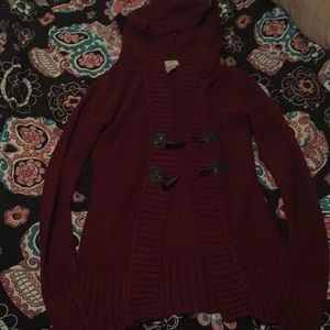 Burgundy sweater with a hood